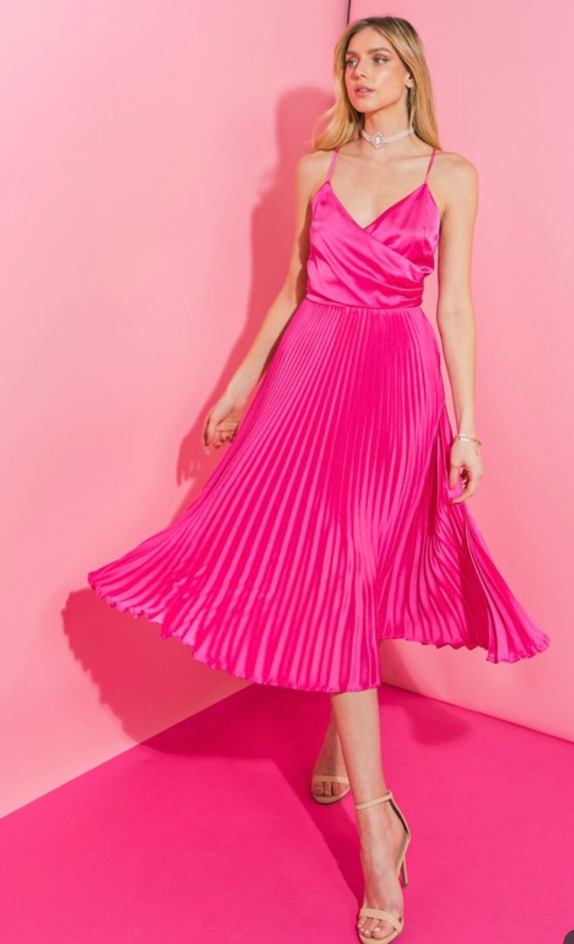 The girl in Pink Pleated Dress